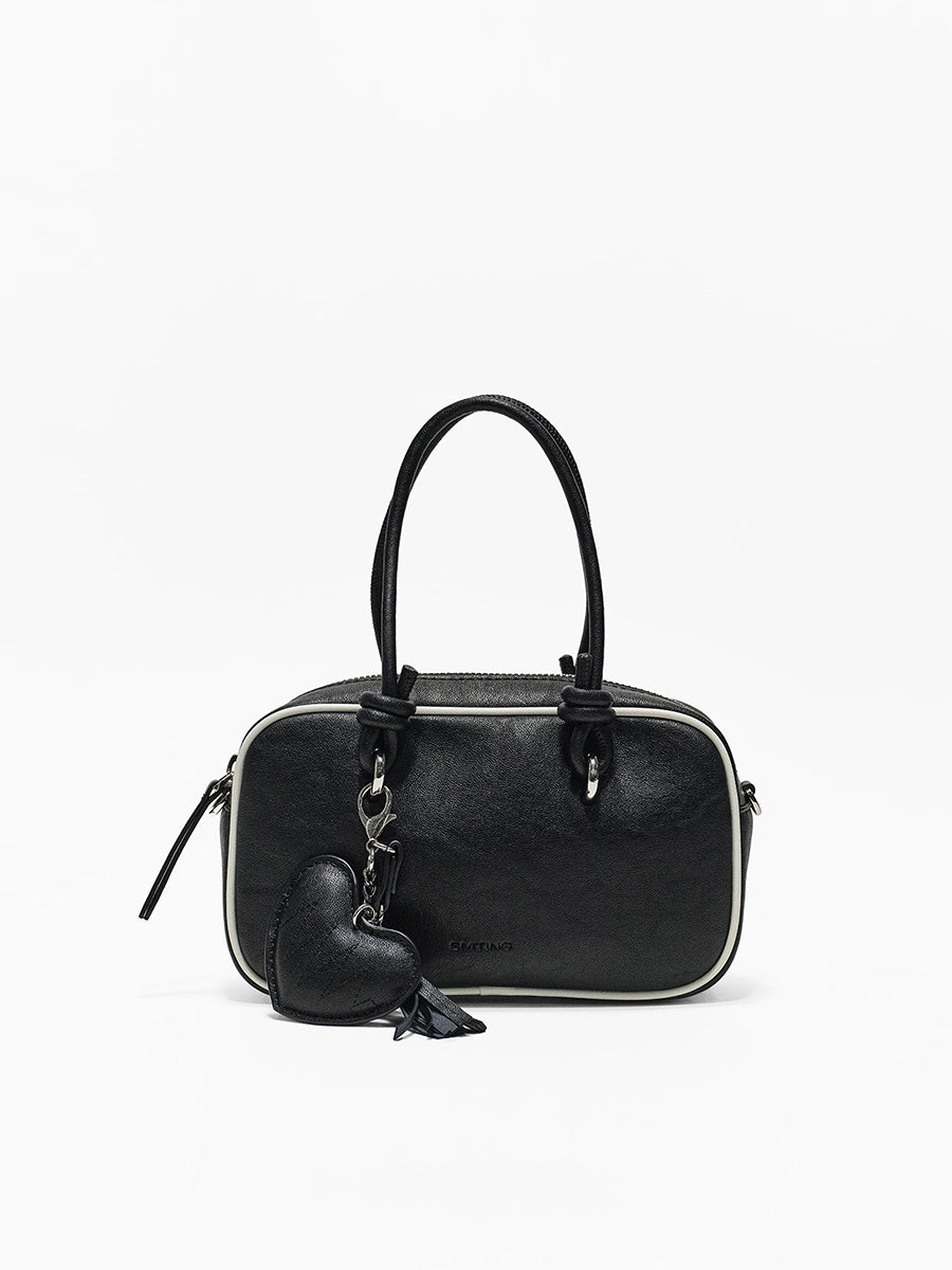 Compact and portable handbag boston bag