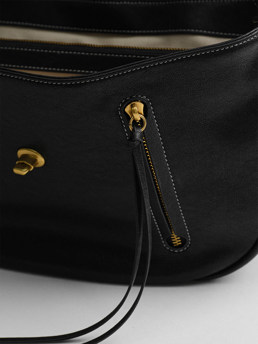 Design-conscious luxury underarm bag