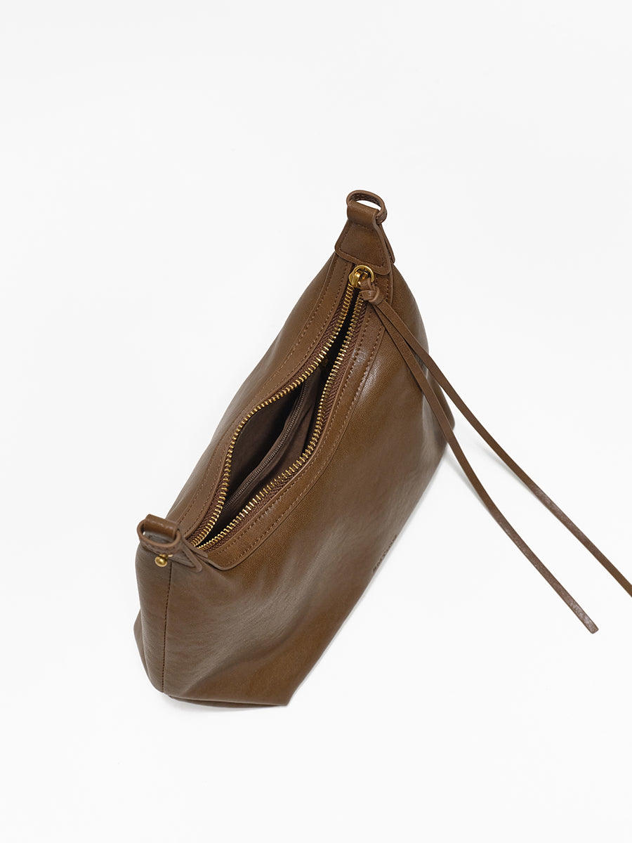 Arc-shaped hand-held hobo bag