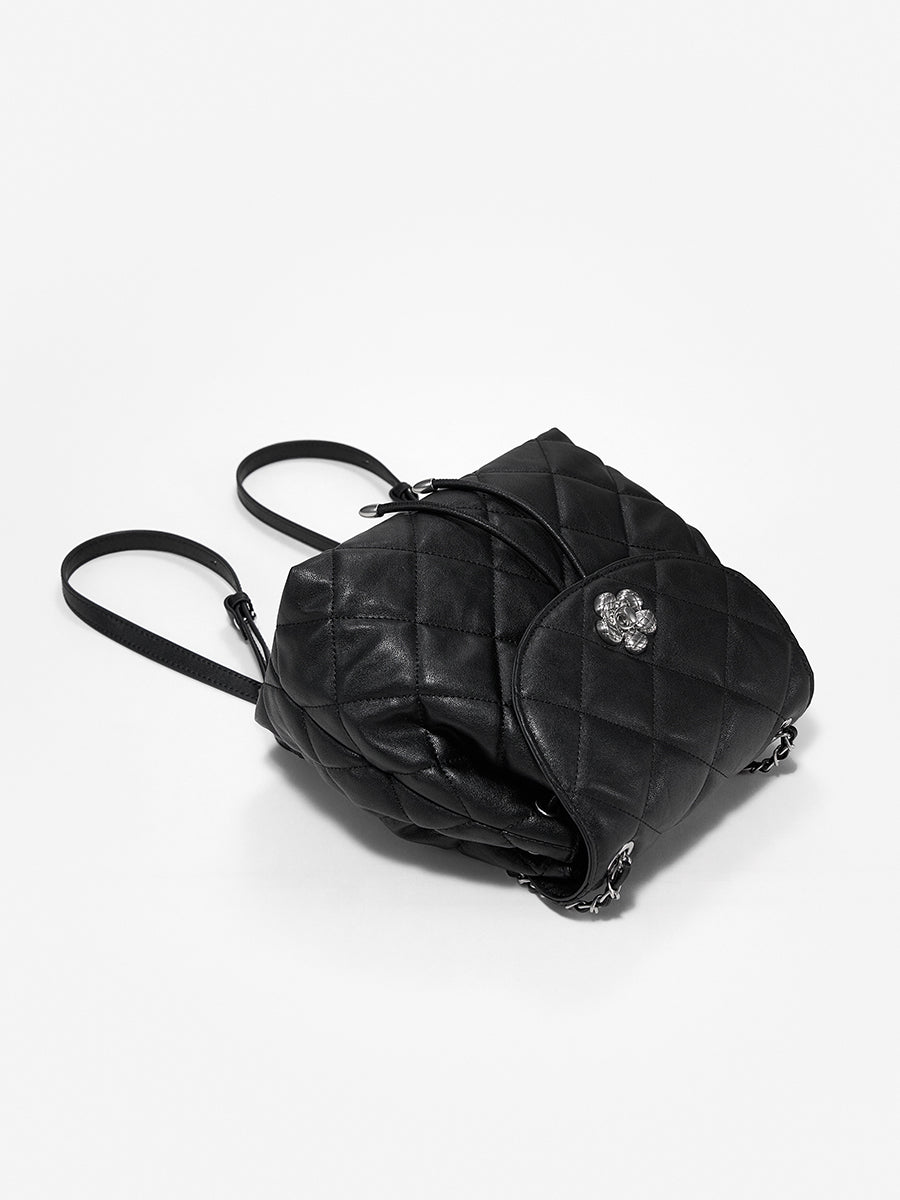 Diamond pattern textured backpack