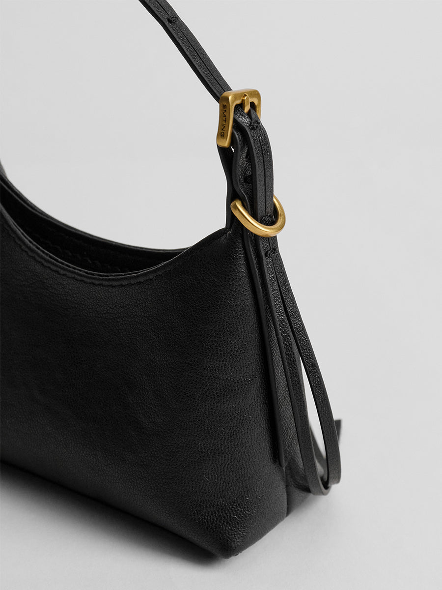 First-layer cowhide mini handbag