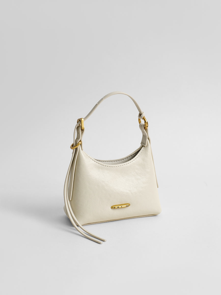 First-layer cowhide mini handbag