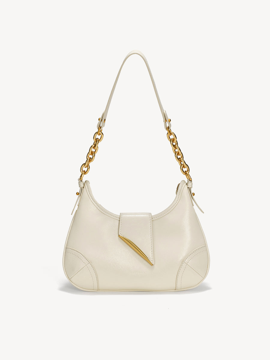 Crescent-shaped compact underarm saddle bag