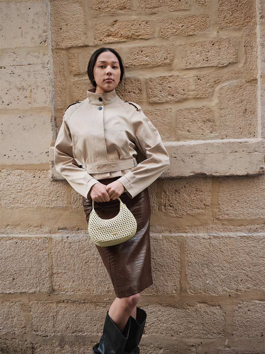 Moon-shaped woven handbag