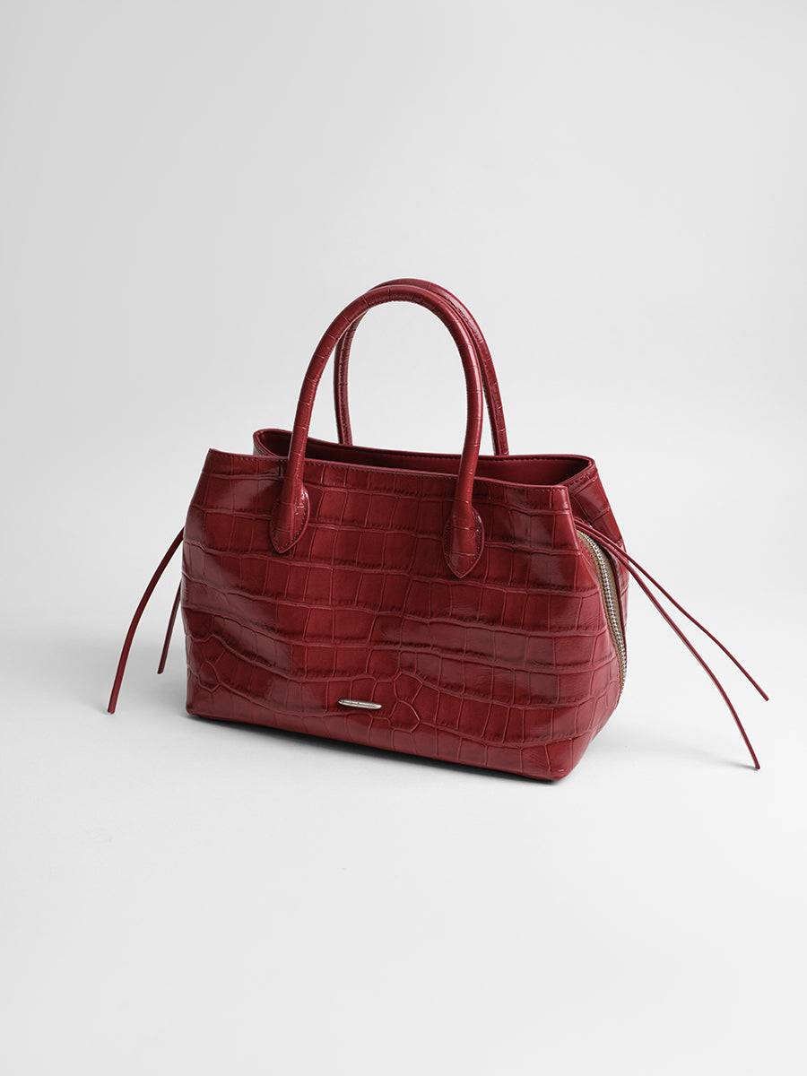 top-grain leather sandwiched bag