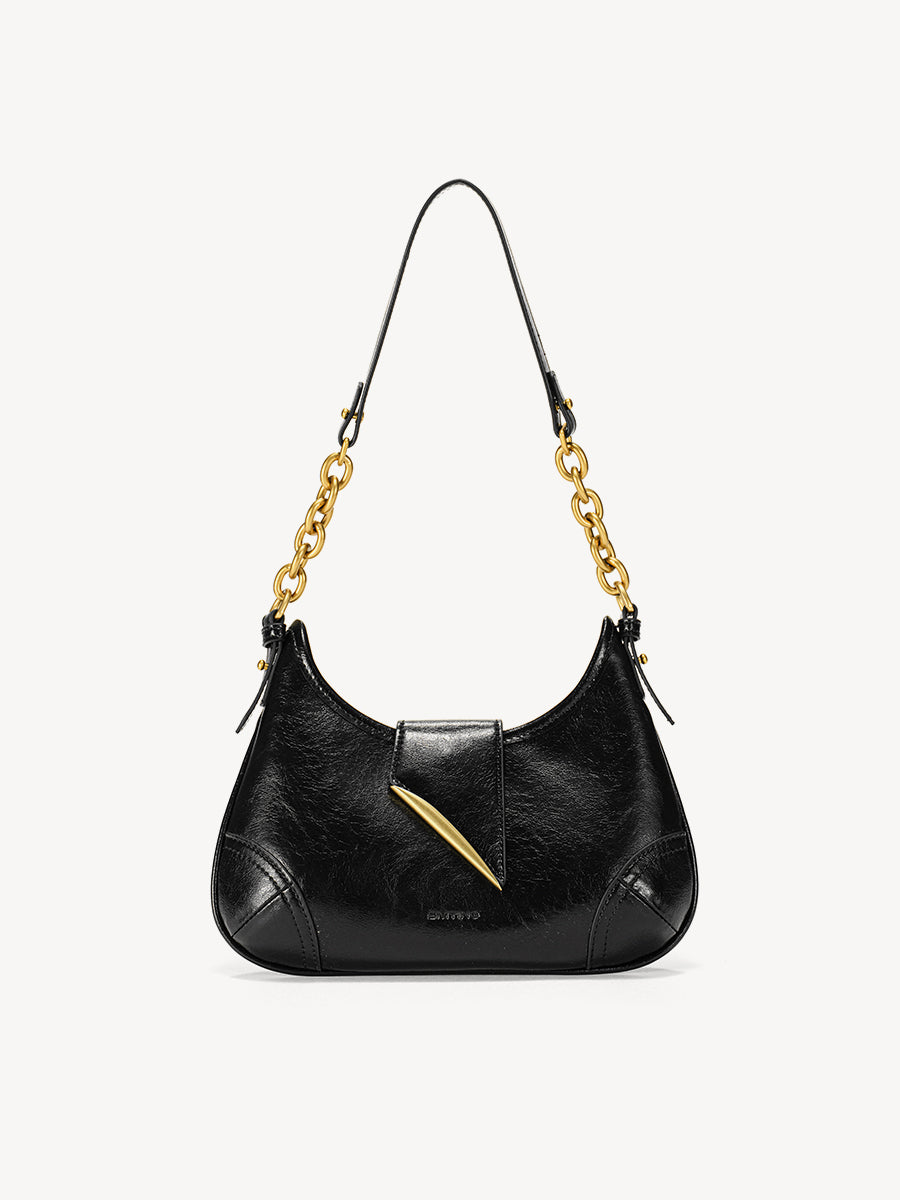 Crescent-shaped compact underarm saddle bag
