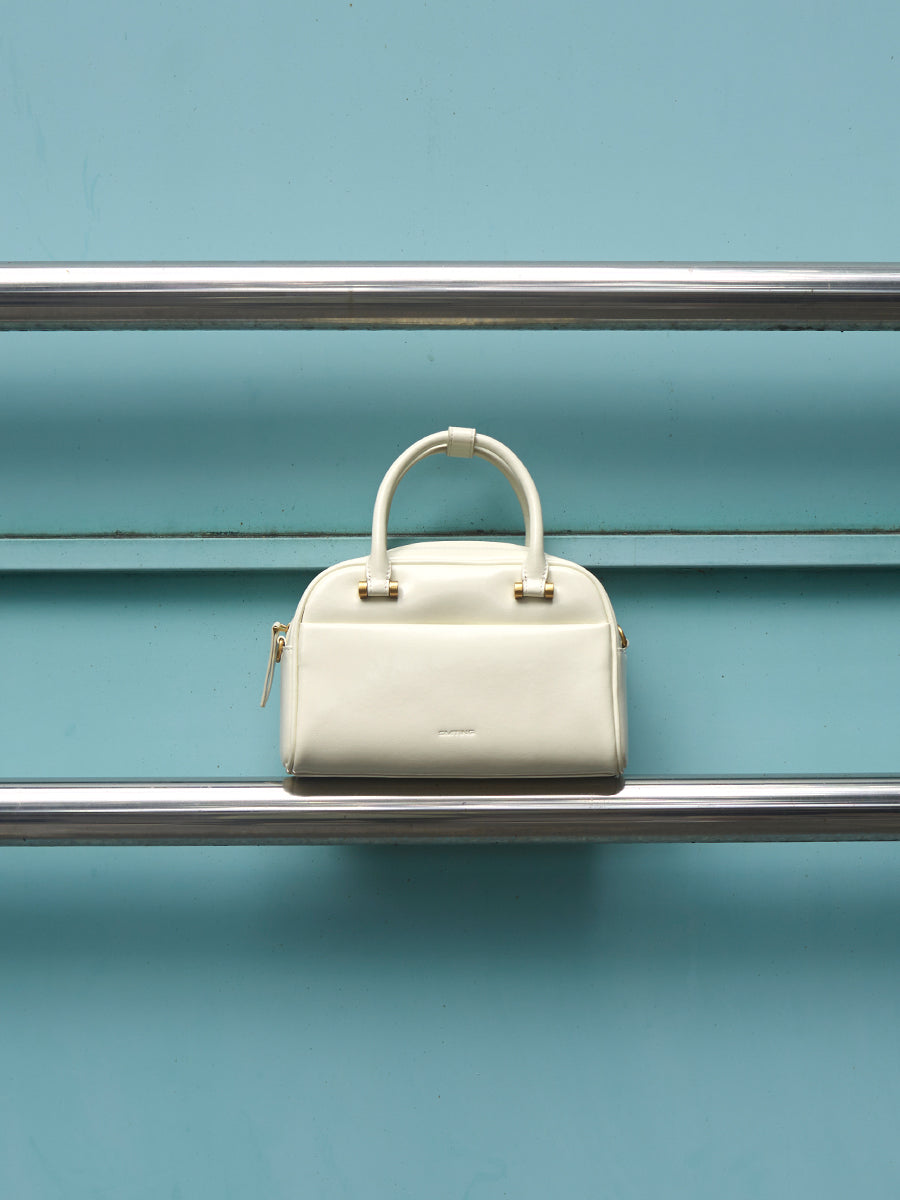 Semi-circular boston bag