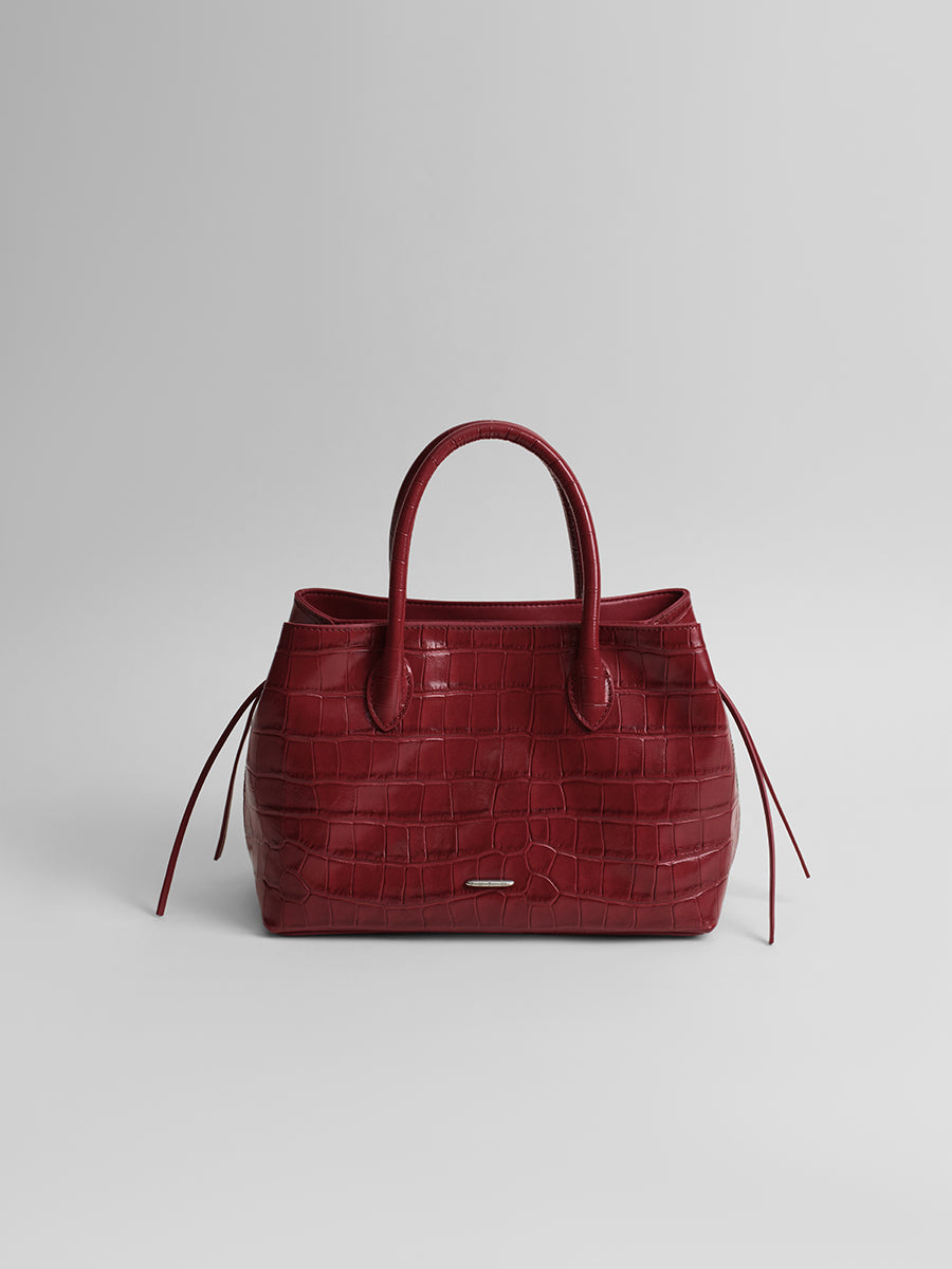 top-grain leather sandwiched bag