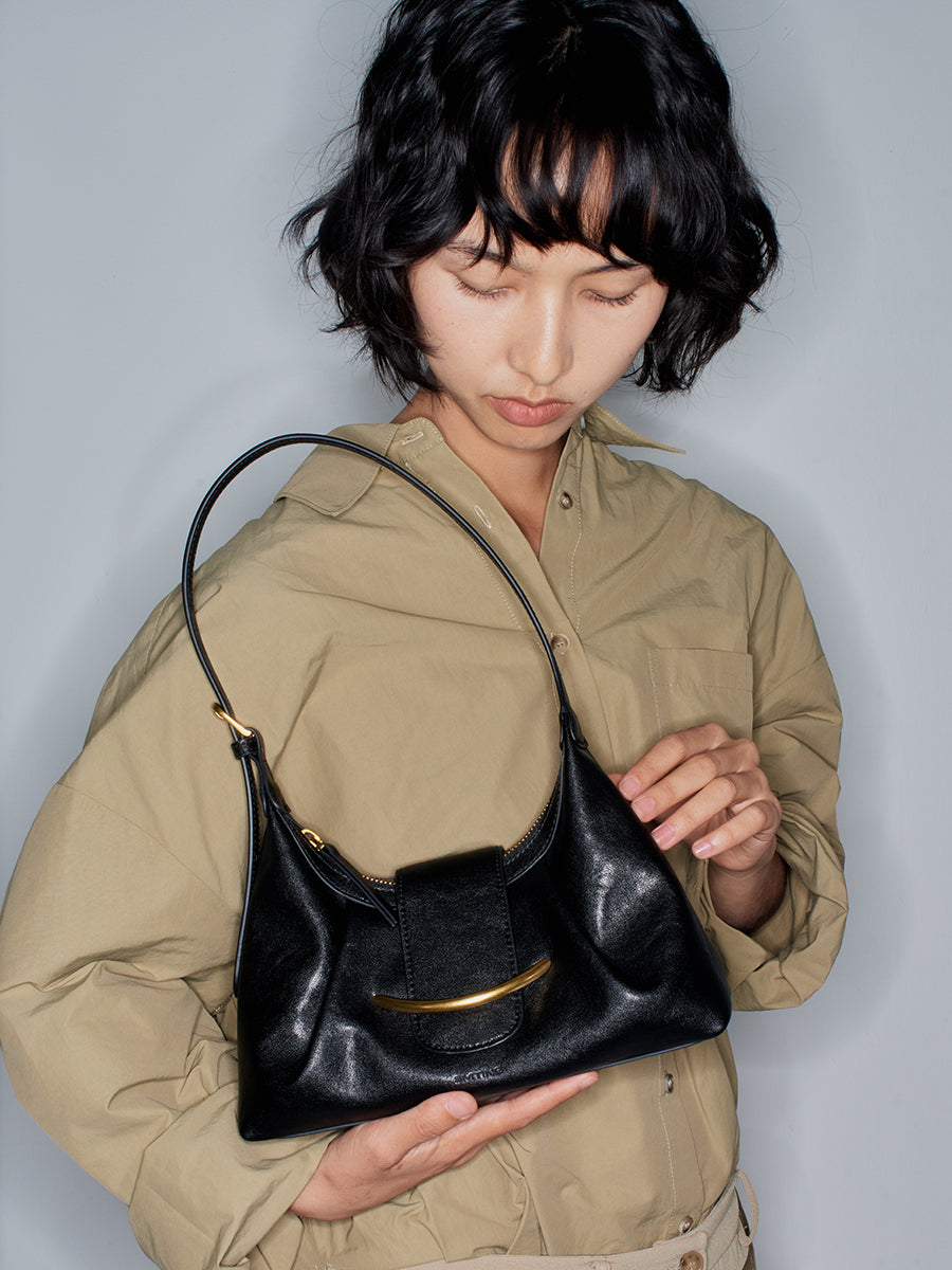 Crescent-shaped delicate hobo bag