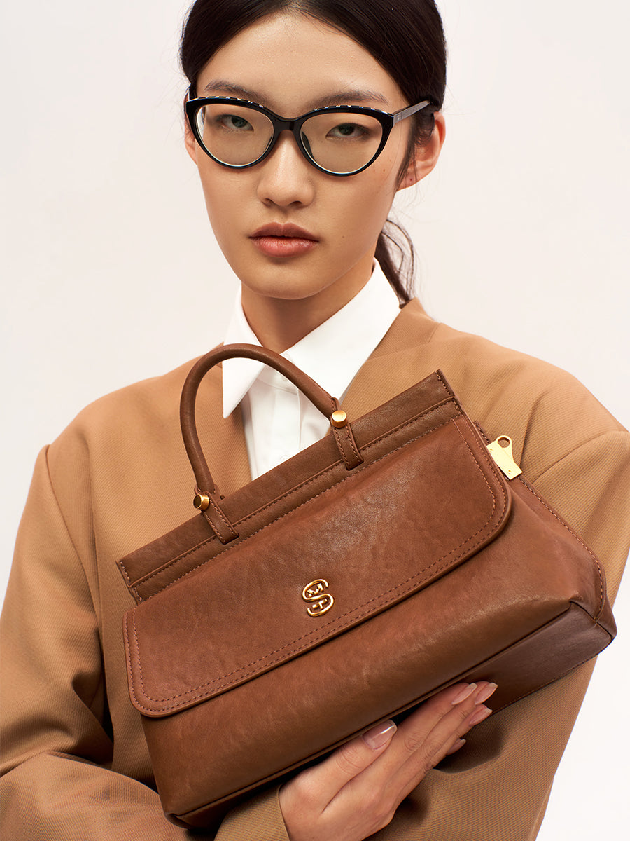 Metal logo kelly bag cowhide handbag