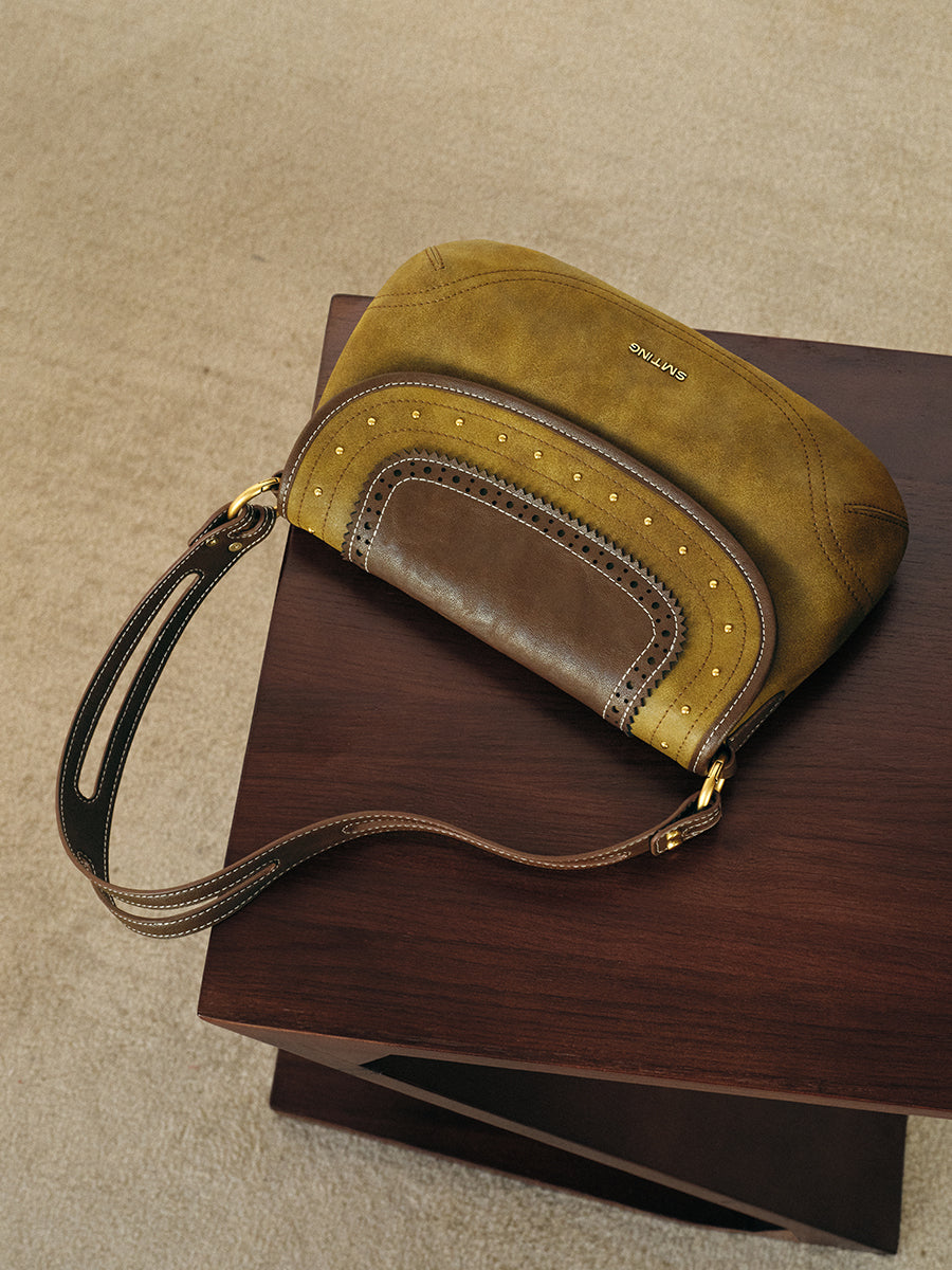 Old leather vintage underarm bag saddle bag