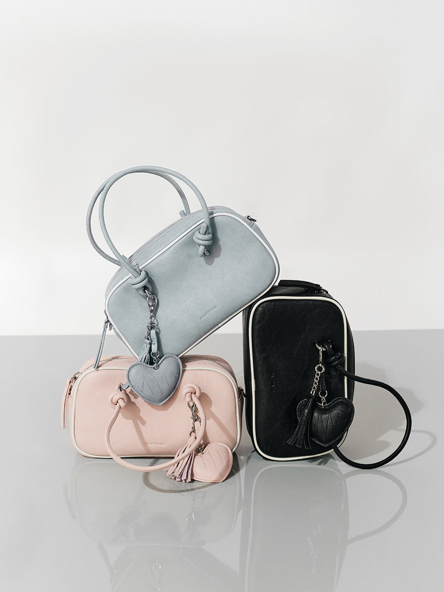 Compact and portable handbag boston bag