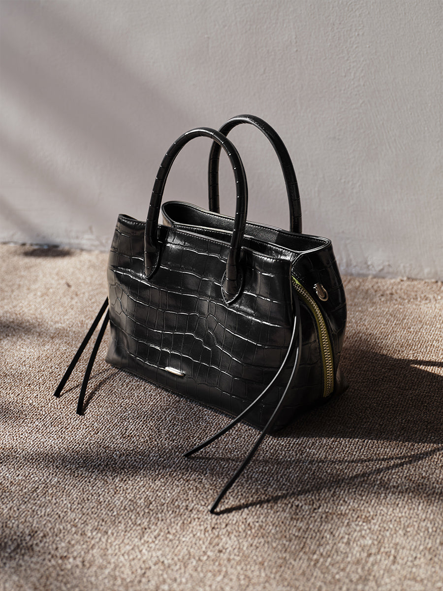top-grain leather sandwiched bag