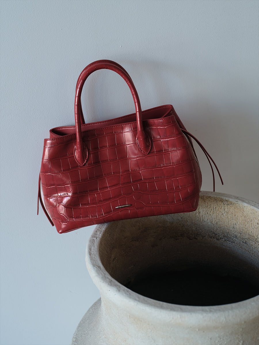 top-grain leather sandwiched bag