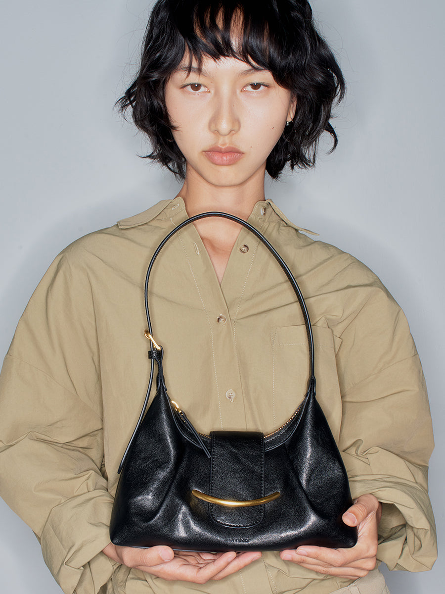 Crescent-shaped delicate hobo bag