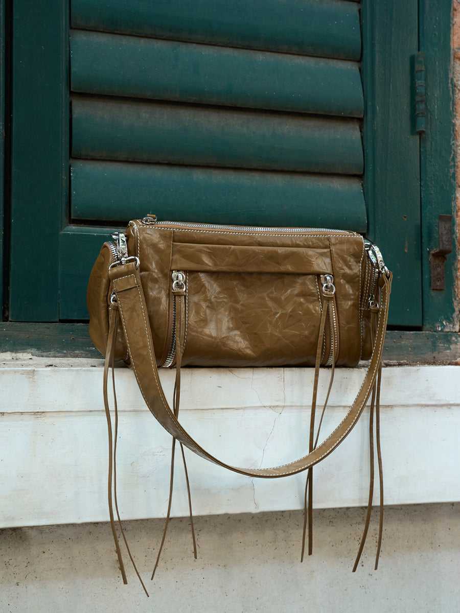 Side pocket motorcycle fringe shoulder bag