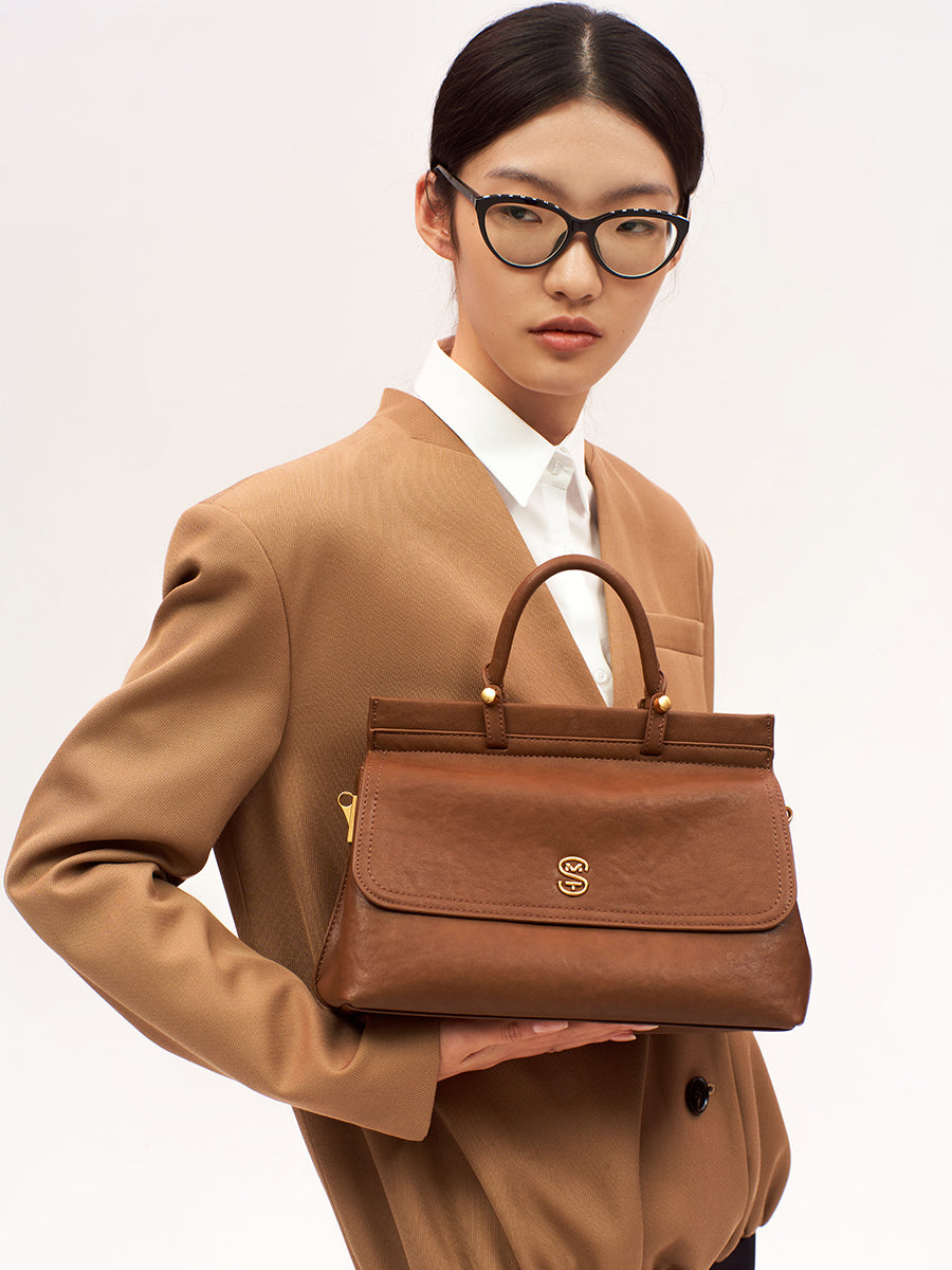 Metal logo kelly bag cowhide handbag