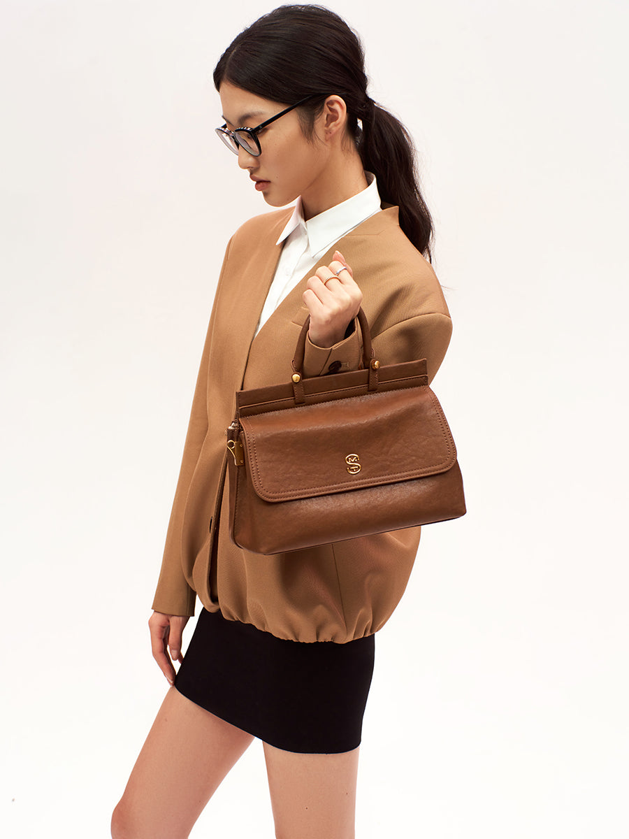 Metal logo kelly bag cowhide handbag