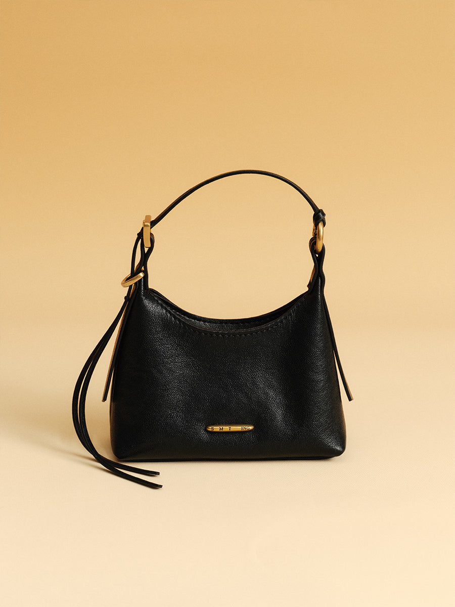 First-layer cowhide mini handbag