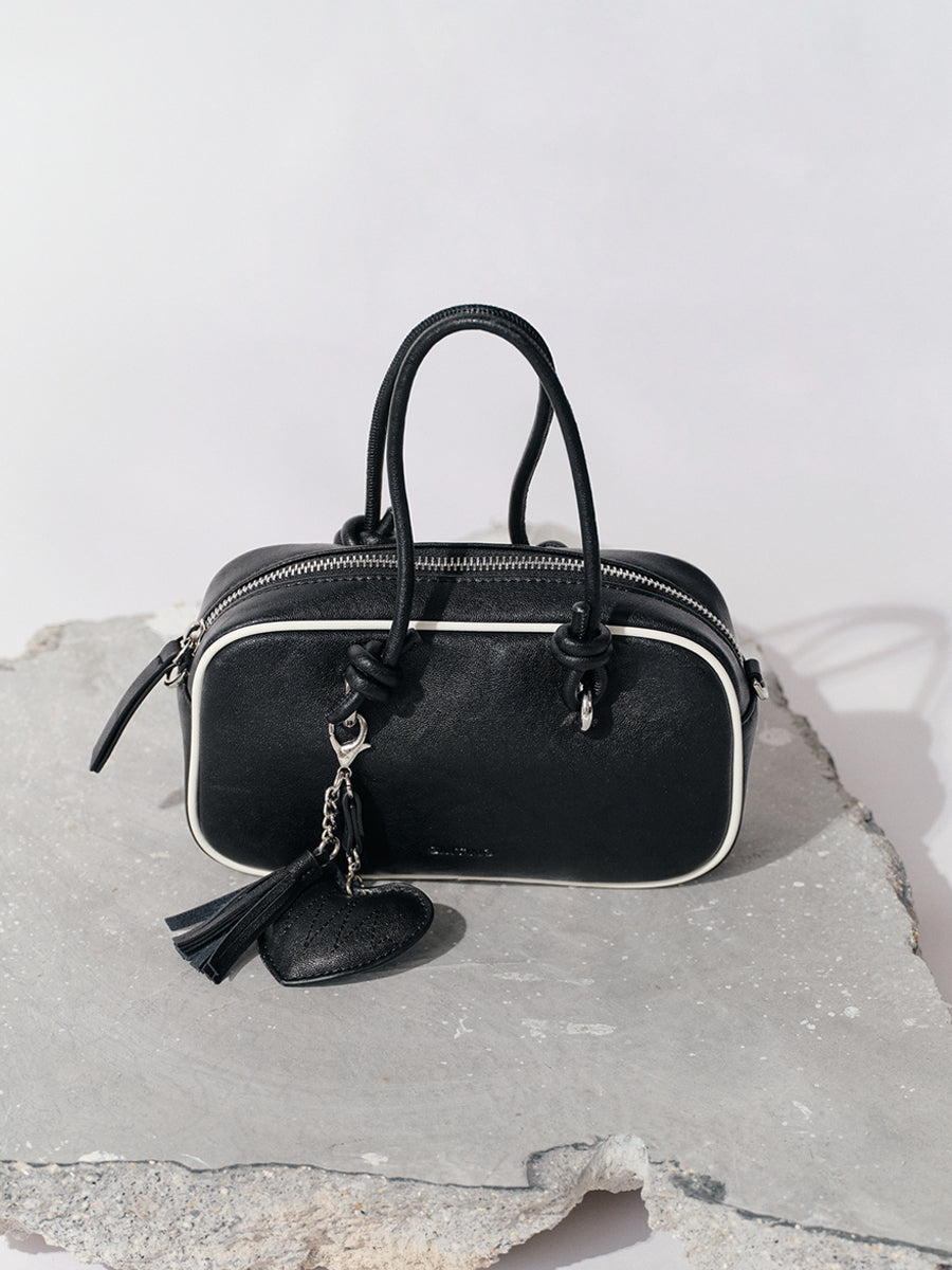 Compact and portable handbag boston bag