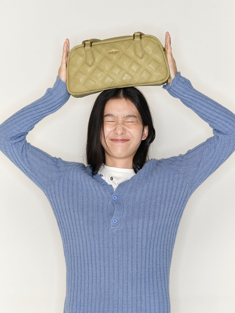 Diamond-patterned boston bag