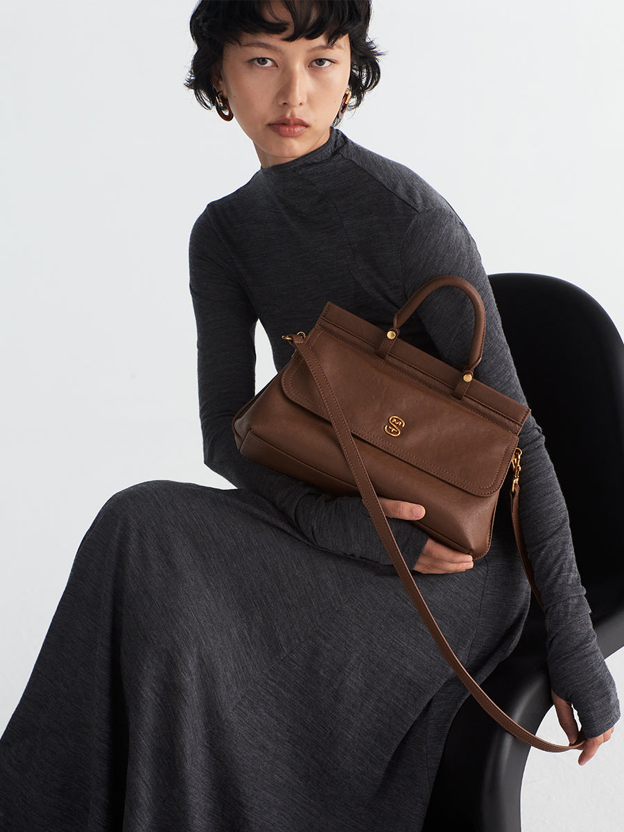 Metal logo kelly bag cowhide handbag