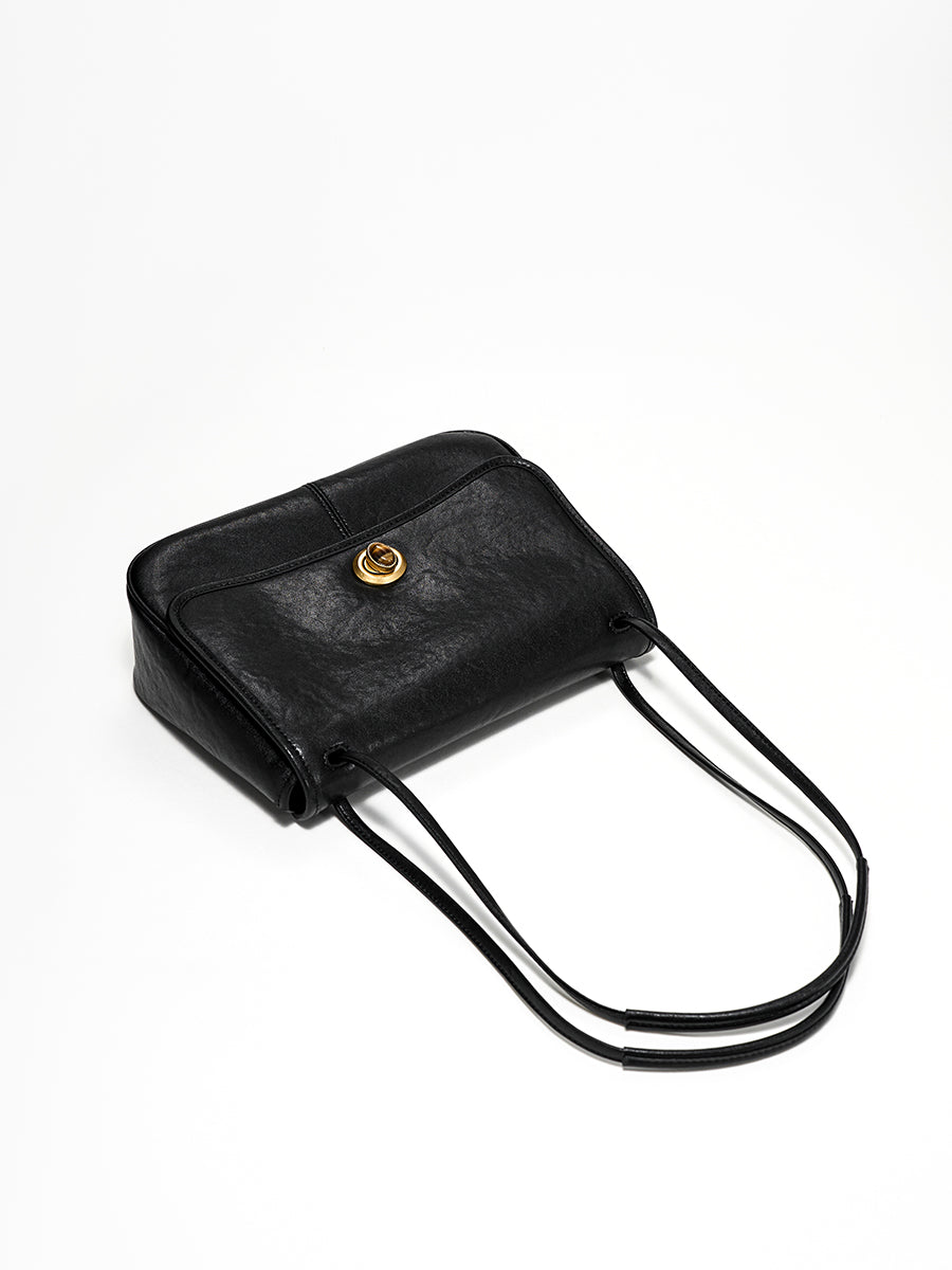 Curved textured square crossbody bag