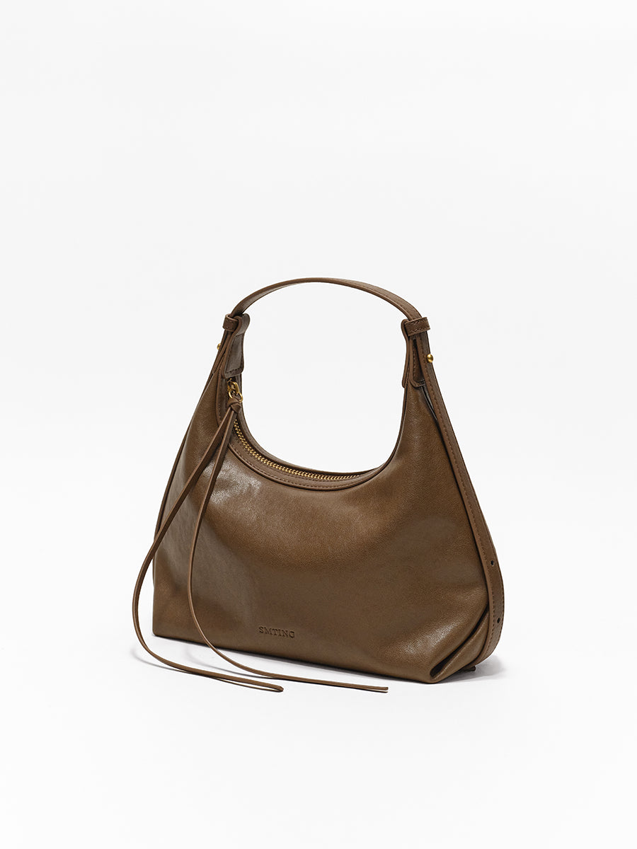 Arc-shaped hand-held hobo bag