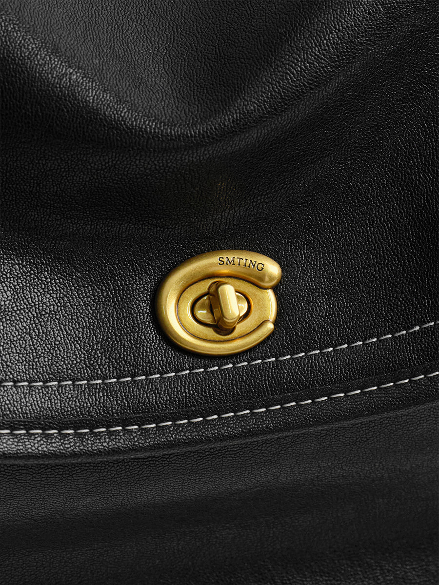 Design-conscious luxury underarm bag