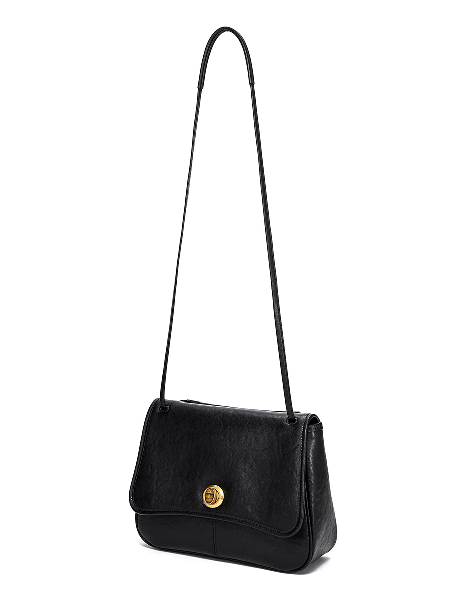 Curved textured square crossbody bag