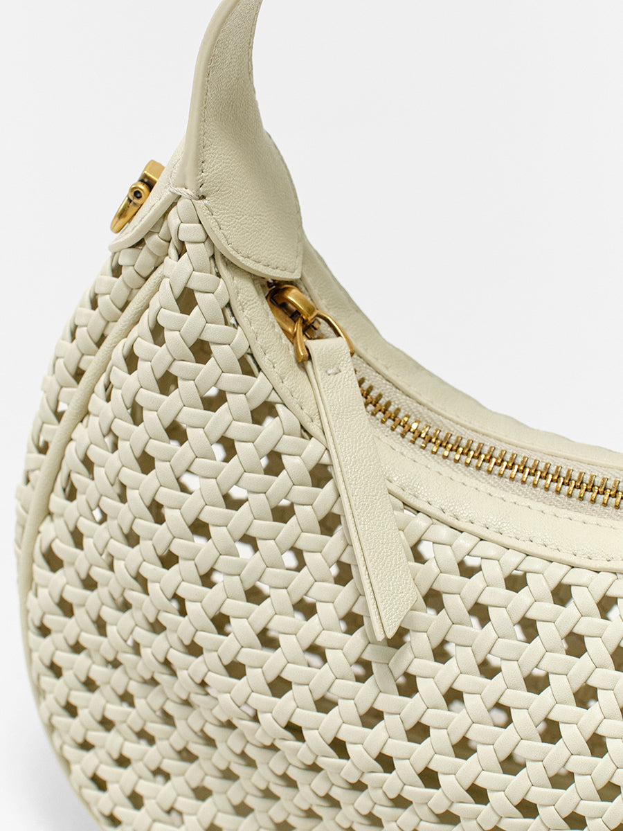 Moon-shaped woven handbag