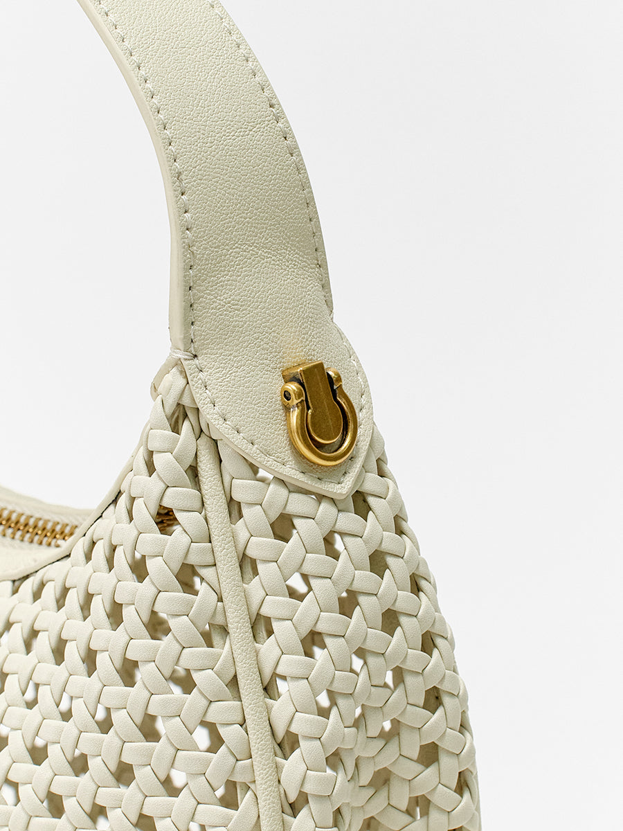 Moon-shaped woven handbag
