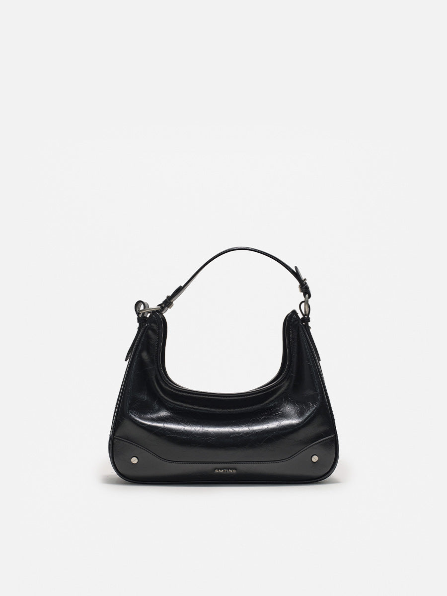 Crescent-shaped underarm bag