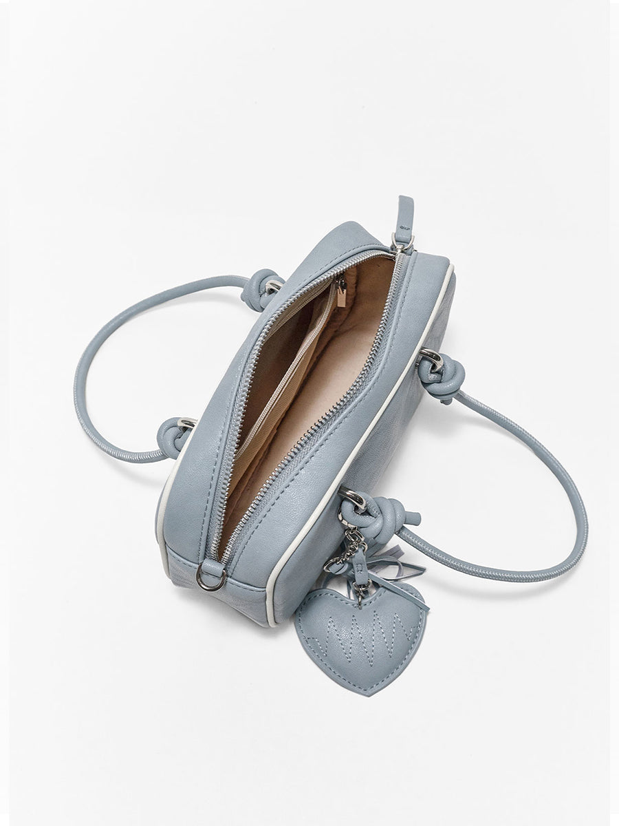 Compact and portable handbag boston bag