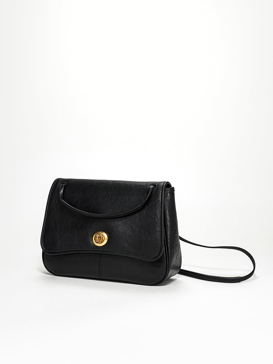 Curved textured square crossbody bag