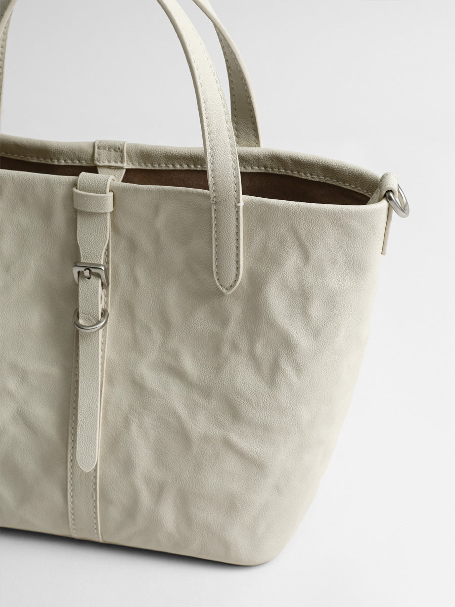 Niche single-shoulder hand-carry bucket bag