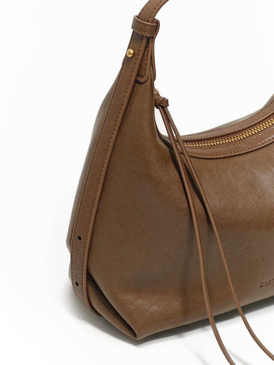 Arc-shaped hand-held hobo bag