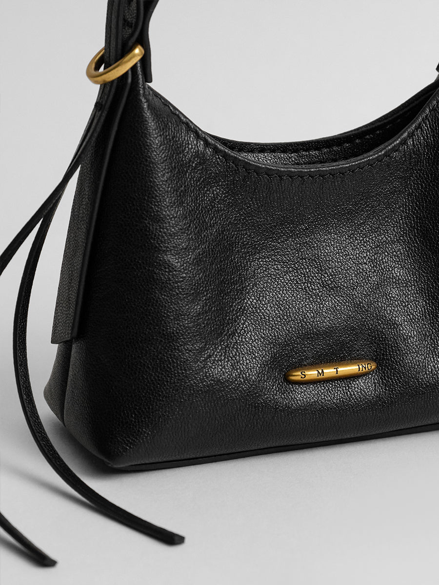 First-layer cowhide mini handbag
