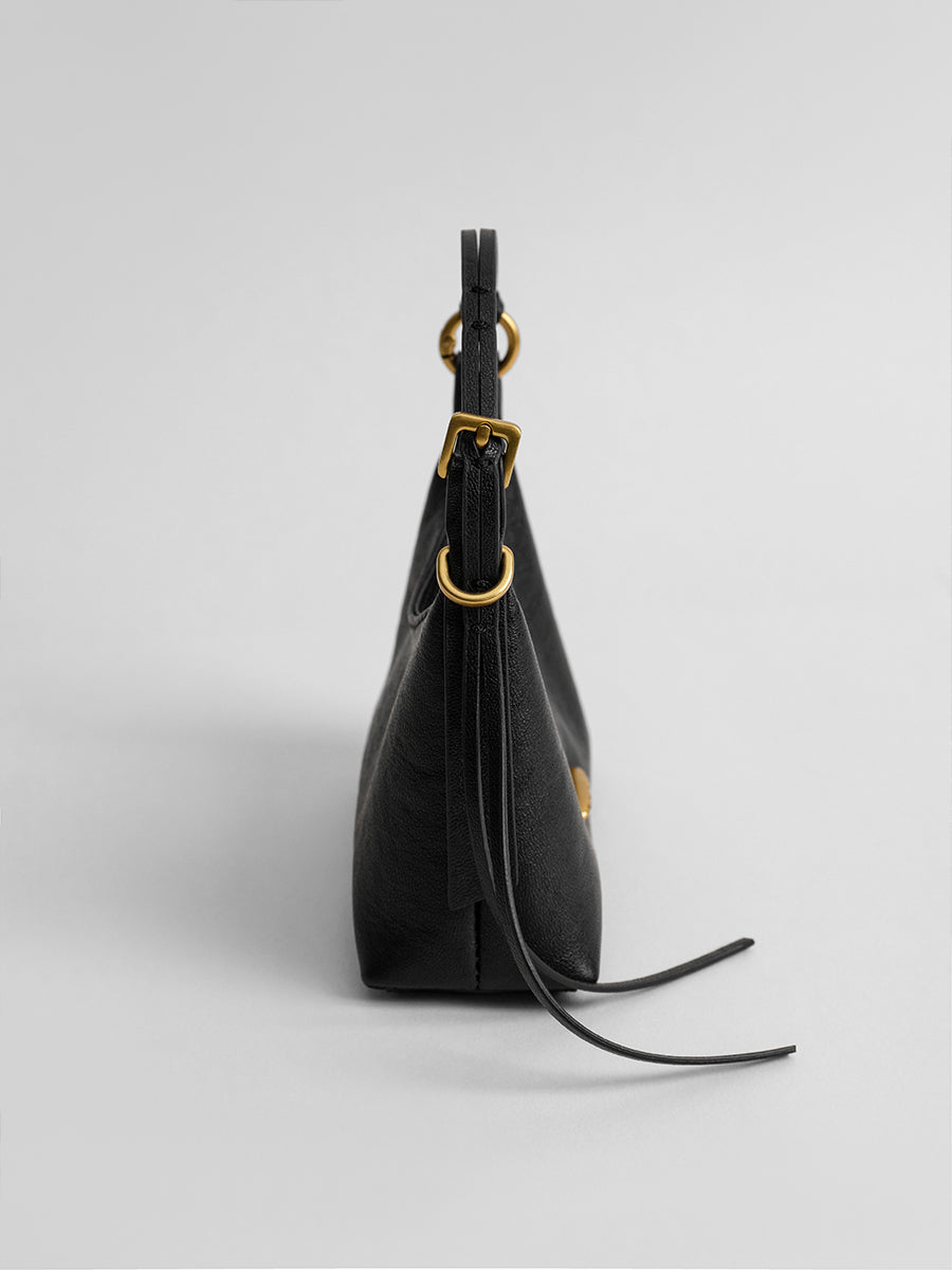 First-layer cowhide mini handbag