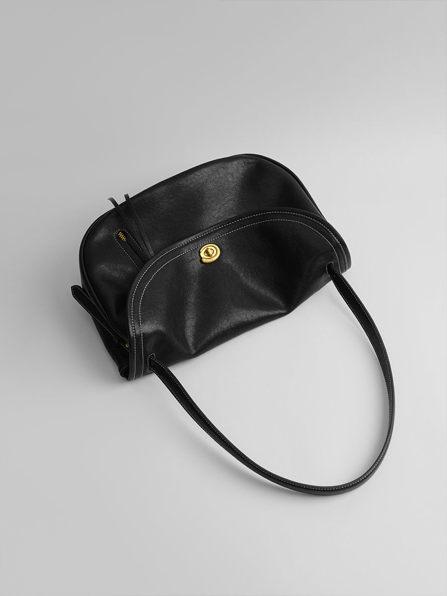 Design-conscious luxury underarm bag