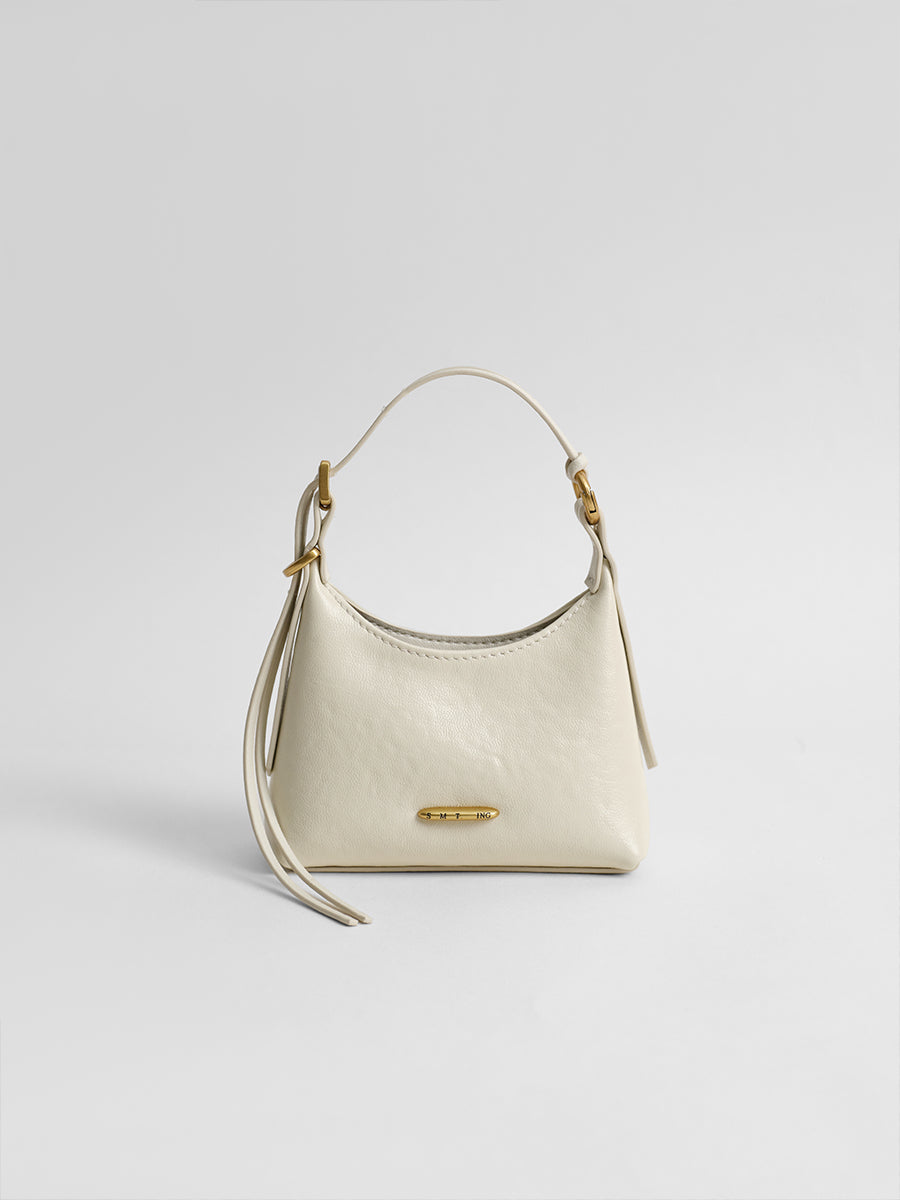 First-layer cowhide mini handbag