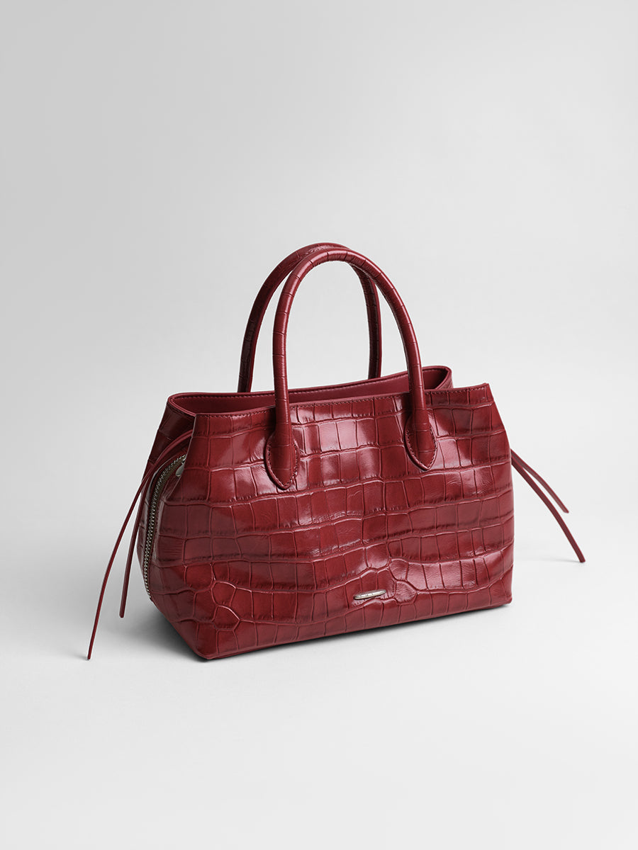 top-grain leather sandwiched bag