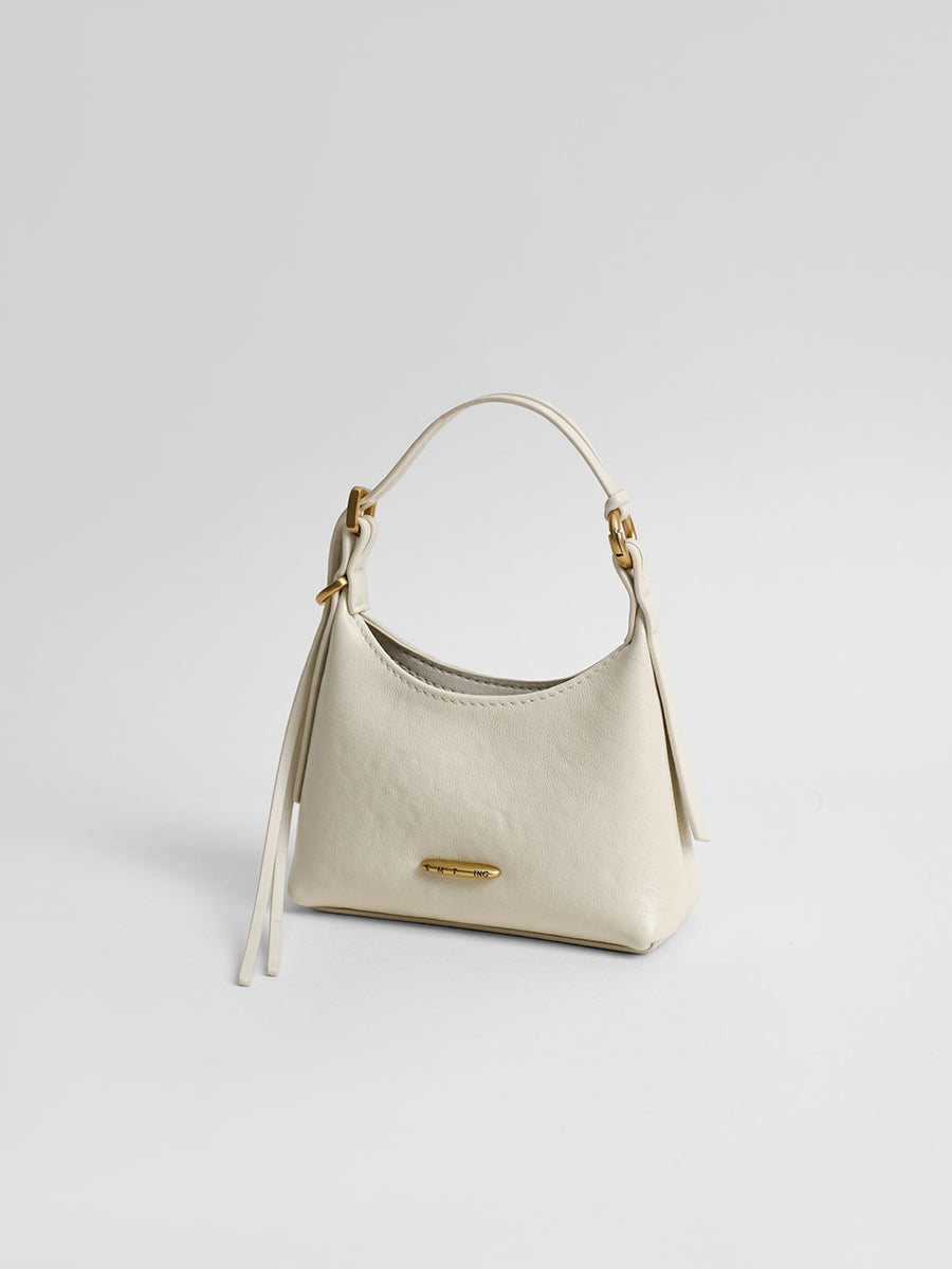 First-layer cowhide mini handbag