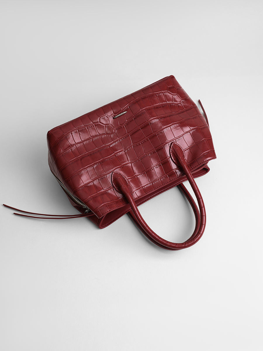 top-grain leather sandwiched bag