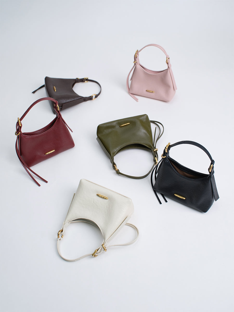 First-layer cowhide mini handbag