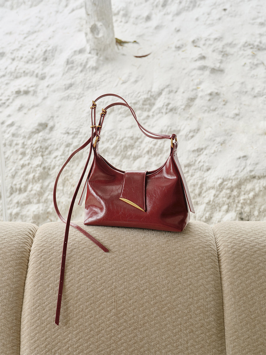 Metal oblique cover shoulder bag