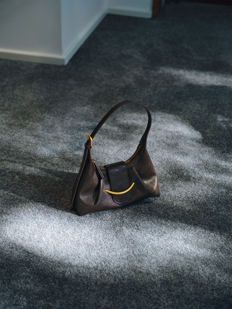 Crescent-shaped delicate hobo bag