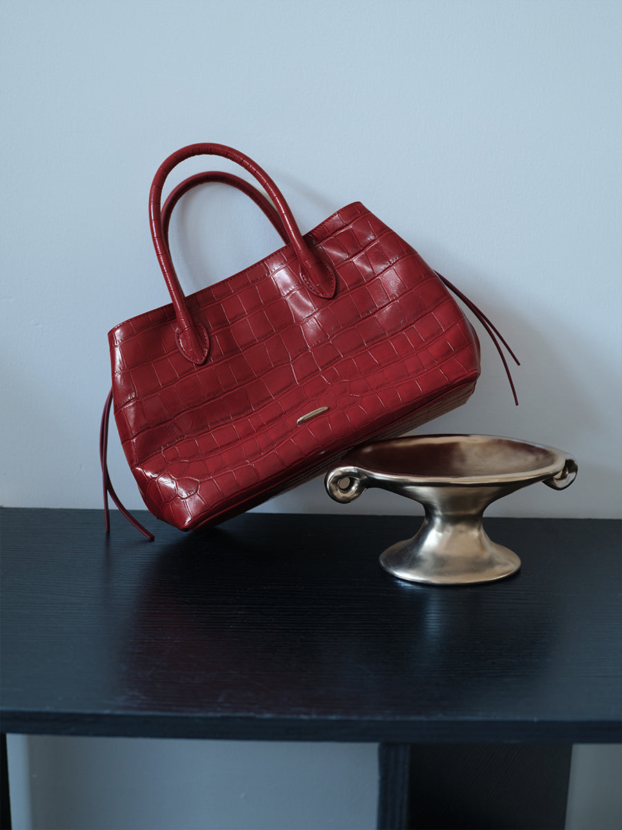 top-grain leather sandwiched bag