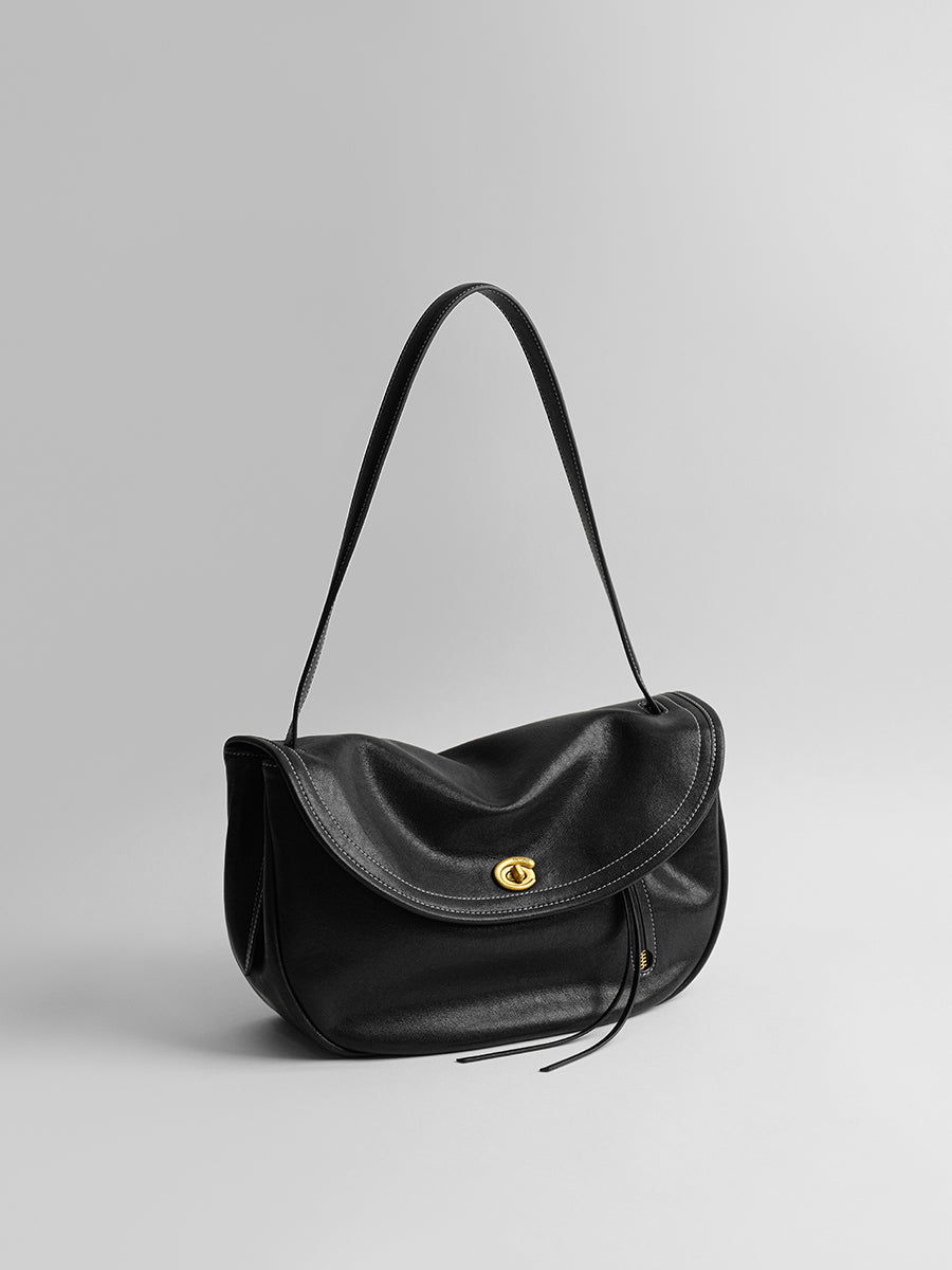 Design-conscious luxury underarm bag