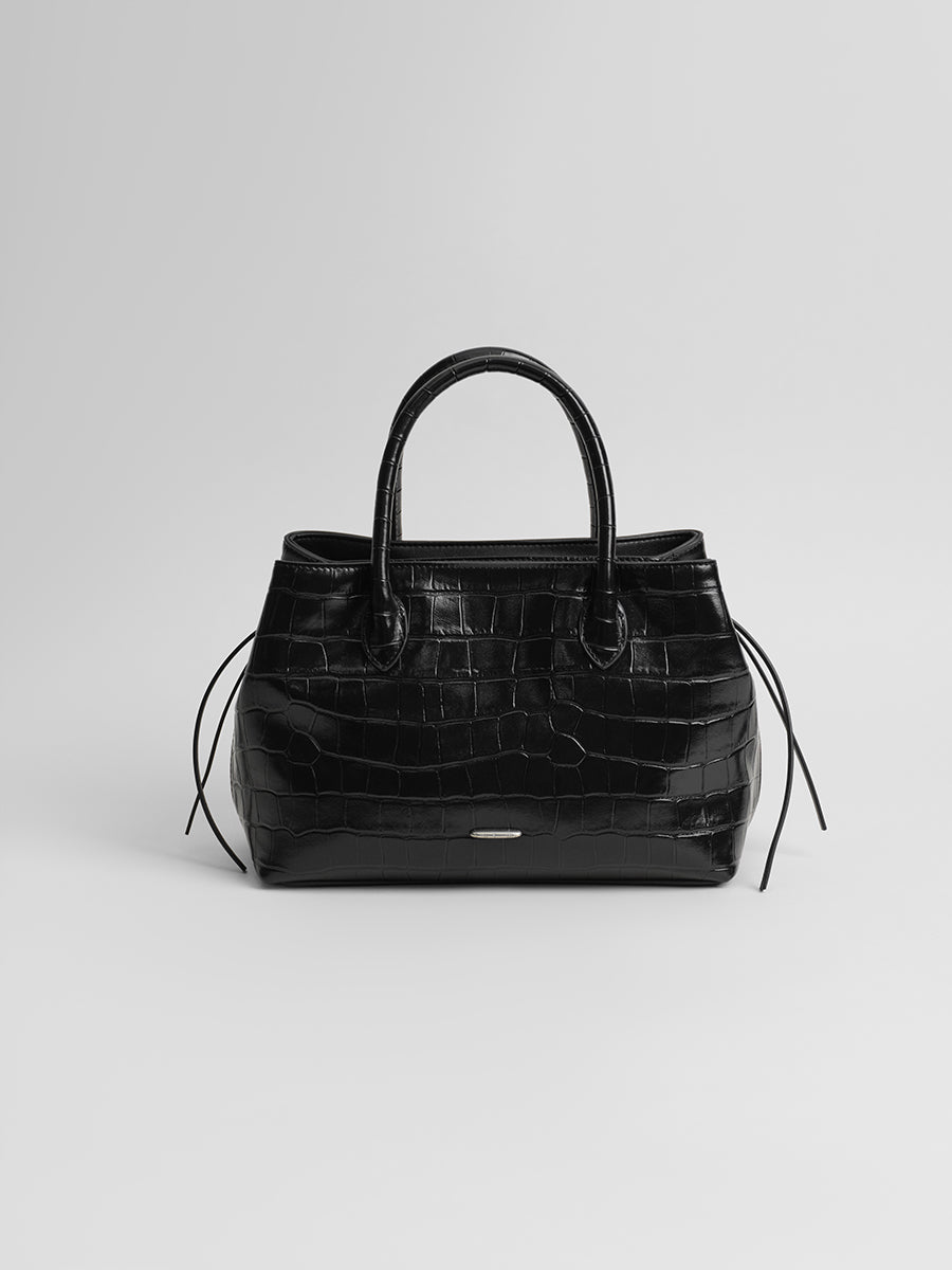 top-grain leather sandwiched bag